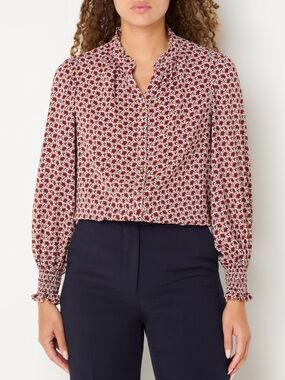 Gerard Darel
Belly blouse with floral print and balloon sleeves NWOT!